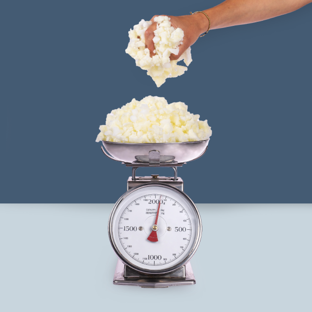 Weighing the pillow's filling on an analogue kitchen scale